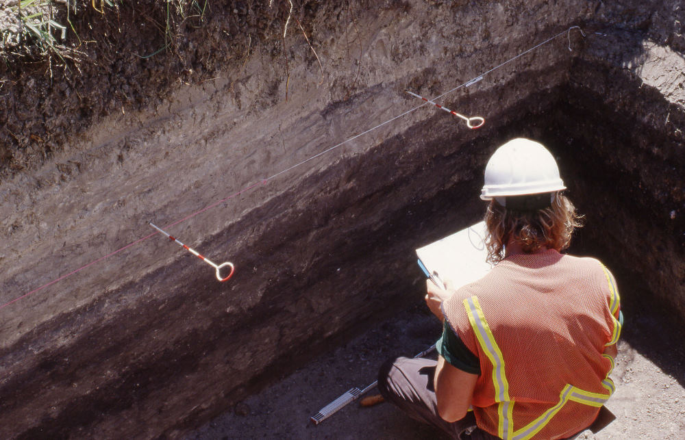 photo of David Driver drawing a profile of one of the test units 