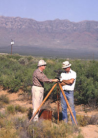 E. Mott Davis considers the layout of excavation units to test the western part of the site.