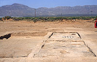 Looking west across the first four rooms of pueblo to be excavated. 