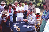 TAS members gather around Mike Collins for a hands-on introduction to Clovis tools.