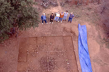 LUAS volunteers in front of House 1. From left, LCRA archeologist Dan Prikryl, Project Director Chuck Hixson; Frank Sloan, Gene Schaffner, Charlotte Graham, and ___***?). Photo by Andy Malof.