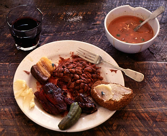 photo of plate of food, bowl of soup, and cup of dark beverage