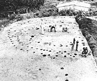 Structural remains of large buildings on east end of first mound platform.