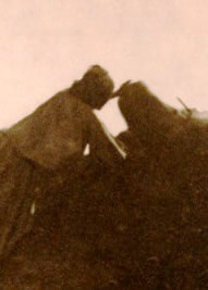 Mescal woman preparing agave mound