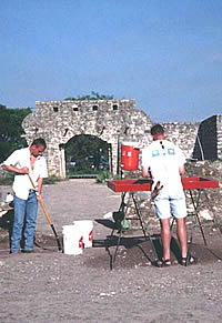 students excavating