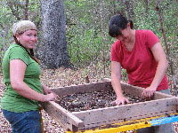 photo of Prewitt and Associates archeologists Bethany Duke and Jenny McWilliams 