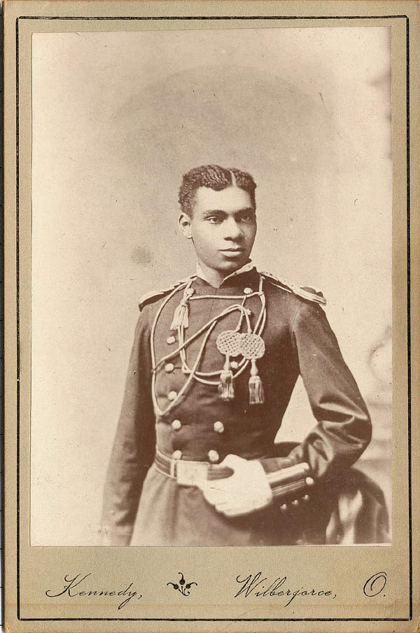 sepia portrait of a man in uniform
						