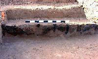 photo of burned postholes