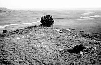 Black and white photo of stone ruins overlooking the Canadian River