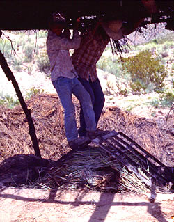 photo of workers and grate